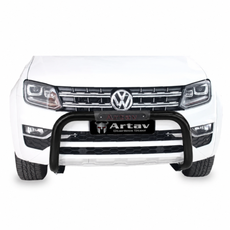 Front view of a white Volkswagen pickup truck with a black bull bar and chrome grille
