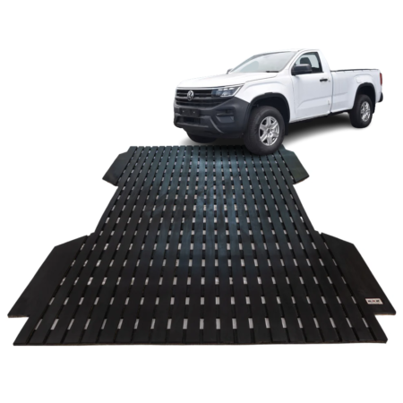 White pickup truck on a large metal vehicle weigh scale plate
